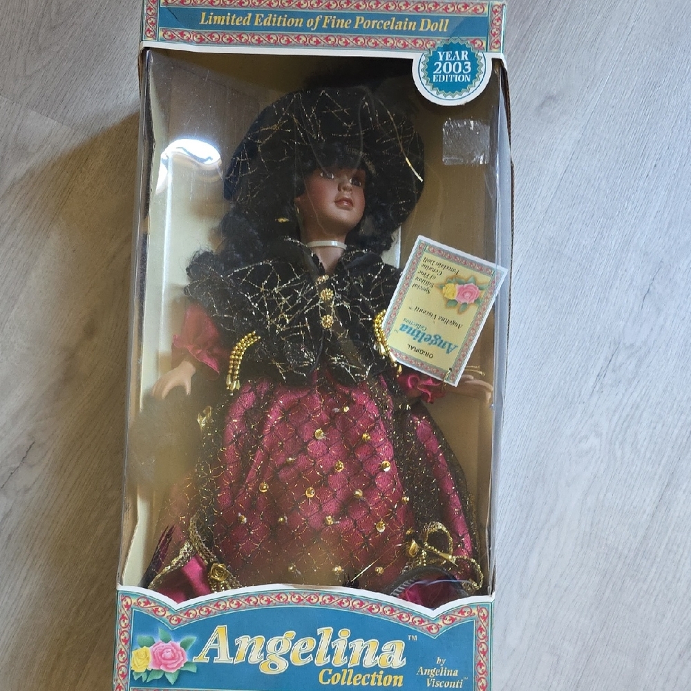 Angelina Porcelain Doll in Black and Pink Ensemble